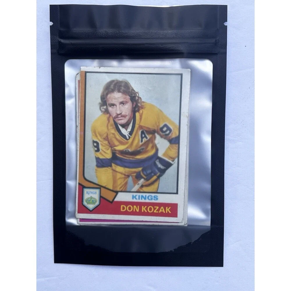 Vintage 1974-75 Topps NHL hockey card lot.